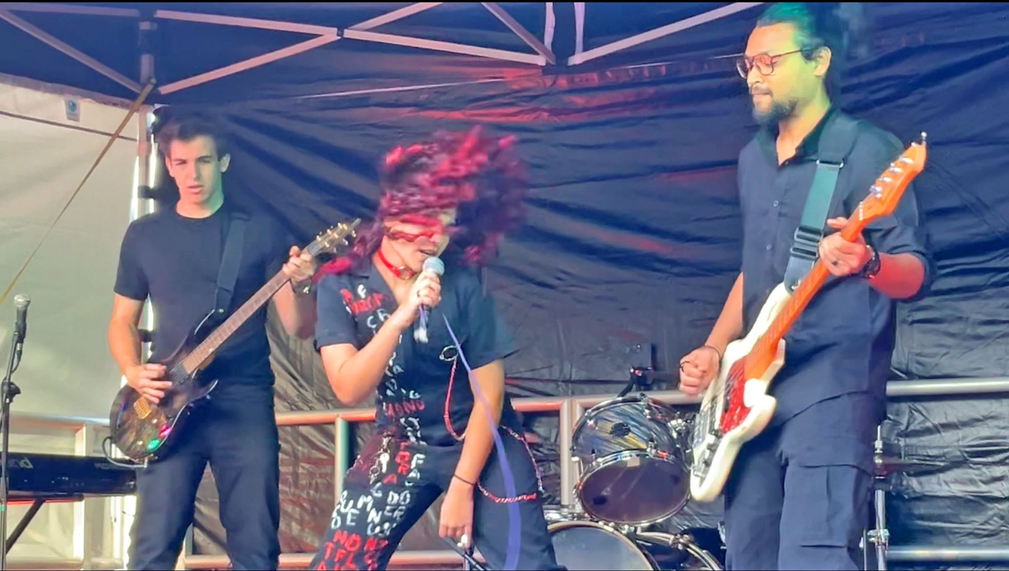 Singer and musicians in energetic performance